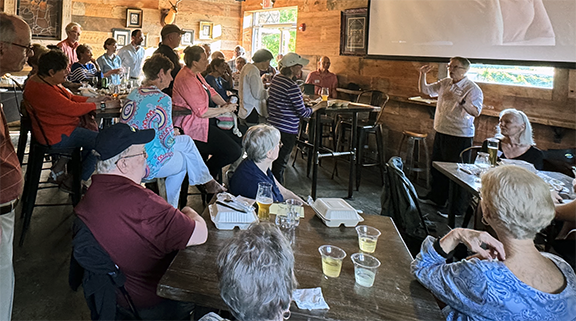 Maggie Speaking at Client Event
